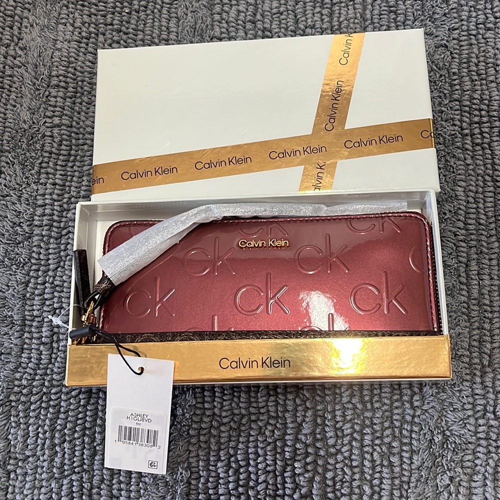 NEW Calvin Klein Wallet Tags On Maroon and Brown
